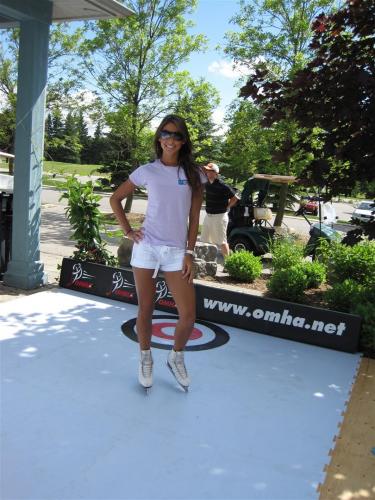 Figure Skater on Synthetic Ice in Summer